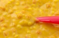 Close view of macaroni and cheese baby food