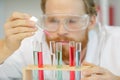close view male scientist using pipette