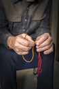 Close view of men's hands with rosary Royalty Free Stock Photo