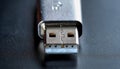 Close View of a Metallic USB Connector on a Dark Surface Showcasing Its Detailed Structure and Electronic Functionality Royalty Free Stock Photo