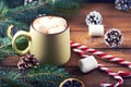 Close view at mug with hot chocolate wooden table