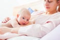 Newborn and mother in relaxed laid back breastfeeding pose Royalty Free Stock Photo