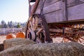 Close view of an old rustic wagon wheel. Royalty Free Stock Photo