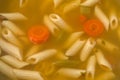 Close view of penne pasta soup