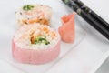 Close View of Pink Sushi and Chopsticks