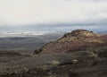 Red volcanic stones, moss and melting glacier on the background, Kverkfjoll, Highlands of Iceland, Europe Royalty Free Stock Photo