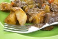 Close view roast beef and vegetable meal