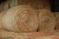 Close view of Round Hay Bales used to feed cattle in the winter. Now stored in the Hay Barn.