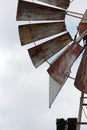 CLOSE VIEW OF RUSTED FINS OF A WINDMILL