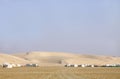 Close view of sand dunes & camping huts Royalty Free Stock Photo