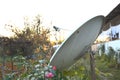 Close view of satellite dish. Telecommunications round antenna. Urban connection receiver. TV connection signal. City radio Royalty Free Stock Photo