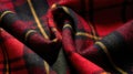 Close up of Folded Red, Black, and Yellow Tartan Wool Fabric Royalty Free Stock Photo