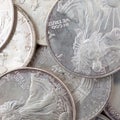 Close view of silver coin bullion from different nations
