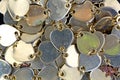 Close view of small metal connected hearts Royalty Free Stock Photo