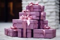 Close view the stack of purple boxes tied with silk ribbon, lying on each other on living. Gift festive selection