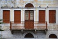 A close view of a stone, old, traditional house and it`s balcony in Calymnos Island