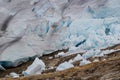 Close view of Svartisen glacier and rocks Royalty Free Stock Photo