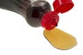 Close view syrup spilling from container Royalty Free Stock Photo