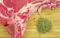 Close view t-bone steak and seasoning Royalty Free Stock Photo