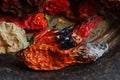 SHRIVELED DRY CHILIS WITH BLACKENING AND SIGNS OF MOLD