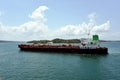 Tanker ship transiting through Panama Canal Royalty Free Stock Photo