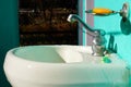 Close view of a tap for morning tooth wash Royalty Free Stock Photo