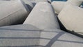 Close view of tetrapod stones on the sea shore to prevent coastal ersosion Royalty Free Stock Photo