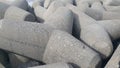 Close view of tetrapod stones on the sea shore to prevent coastal ersosion Royalty Free Stock Photo