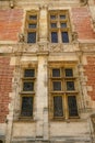 Renaissance style mullioned windows of the episcopal palace in the city of Sens