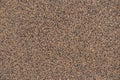Close view of wall with brown and black pebbledash finish Royalty Free Stock Photo