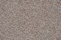 Close view of the wall surface, decorative finishing, heat insulation granules or granite particles