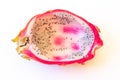 Close view of a white dragon fruit with pulp spooned out, isolated on white Royalty Free Stock Photo