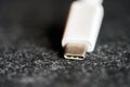Close view of a white USB-C connector Royalty Free Stock Photo