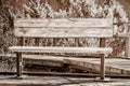 Close view of wooden bench in a park Royalty Free Stock Photo