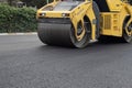 New asphalt road. Road asphalt works. Construction works. Royalty Free Stock Photo