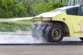 Close view on the working road roller. Royalty Free Stock Photo