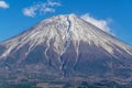 Close zoom detail of top covered with snow of Fuji mountain in Japan. Royalty Free Stock Photo