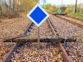 Closed abandoned railway in industry zone. End of track with a train railway