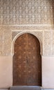 Closed Arabic-style door in the Nasrid palaces of the Alhambra complex in Granada, Spain Royalty Free Stock Photo