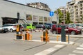 Closed automatic barrier gate with CCTV camera on the parking lot at the supermarket Lidl. Modern automatic entry system. Shopping