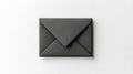 Closed black envelope resting on white background symbolizing email communication Royalty Free Stock Photo