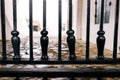 Closed black forged fence in the city. Closed cities and attractions. Flash COVID-19. Royalty Free Stock Photo