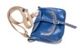 Closed blue leather handbag with textile strap Royalty Free Stock Photo