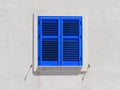 Closed blue wooden shutters on white wall of typical of Mediterranean Sea vintage house. Royalty Free Stock Photo