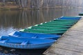 Closed boat station on the pond in the fall Royalty Free Stock Photo