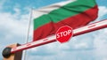 Closed boom gate on the Bulgarian flag background. Restricted entry or certain ban in Bulgaria. 3D rendering