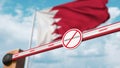 Closed boom gate with no immigration sign on the Bahraini flag background. Border closure or immigration ban in Bahrain