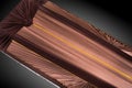 Closed brown coffin covered with elegant cloth on gray background. coffin close-up.