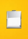 Closed card holder isolated on yellow background Royalty Free Stock Photo