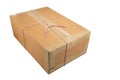 Closed cardboard box taped up and isolated Royalty Free Stock Photo